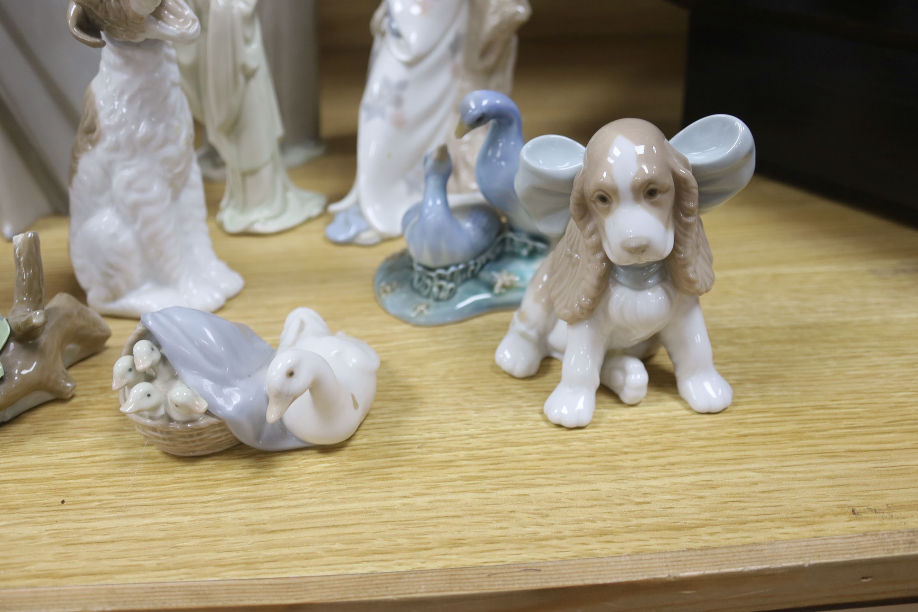 Four pieces of Lladro porcelain and assorted Nao etc (10)